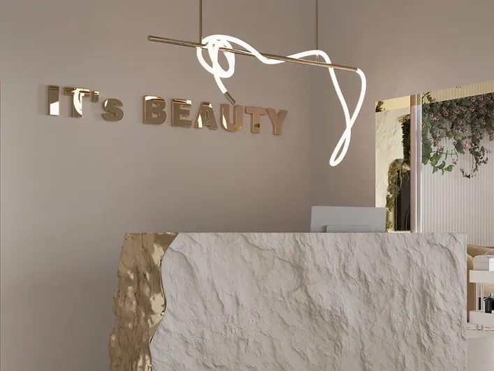 Reception area of beauty salon in Business Bay Dubai with minimalistic design and brand logo on the wall