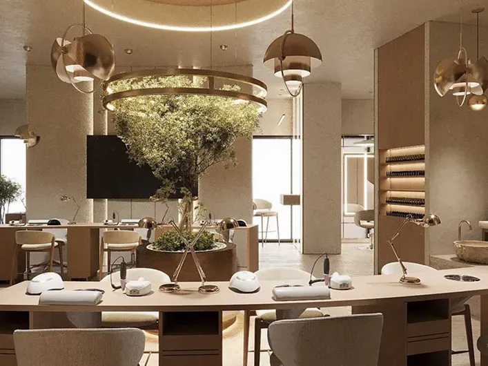 Elegant beauty salon in DIFC Dubai featuring manicure stations and contemporary luxury interior
