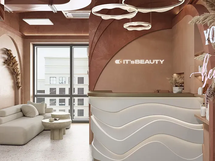 Modern beauty salon interior in Internet City Dubai with stylish reception desk and warm design