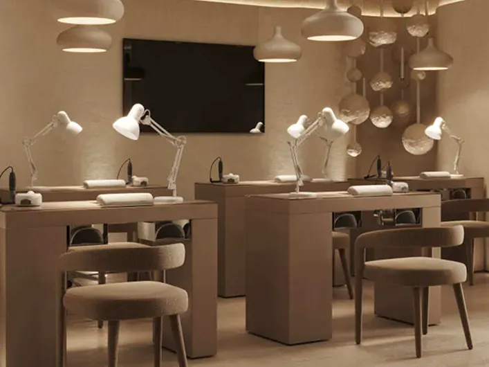 Spacious beauty salon in Dubai Marina with professional manicure tables and soft lighting