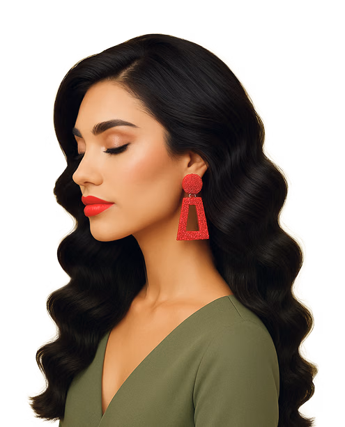 Woman with glamorous makeup and styled waves, showcasing professional makeup services in Dubai salon