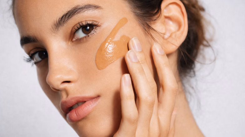 Blending foundation into skin for natural finish and better product absorption